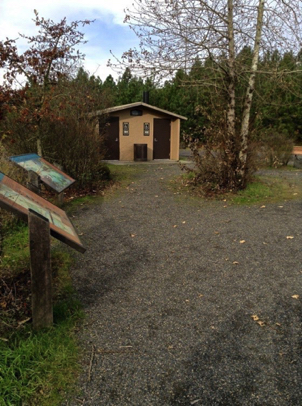 Location of interpretive signs near the restroom/parking lot